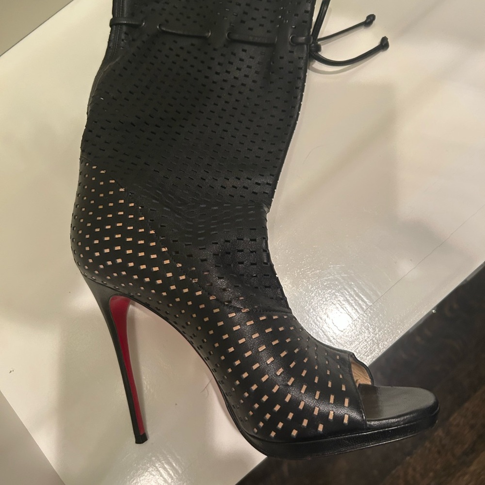 Christian Louboutin Black Cutout Boots with Signature Red Sole